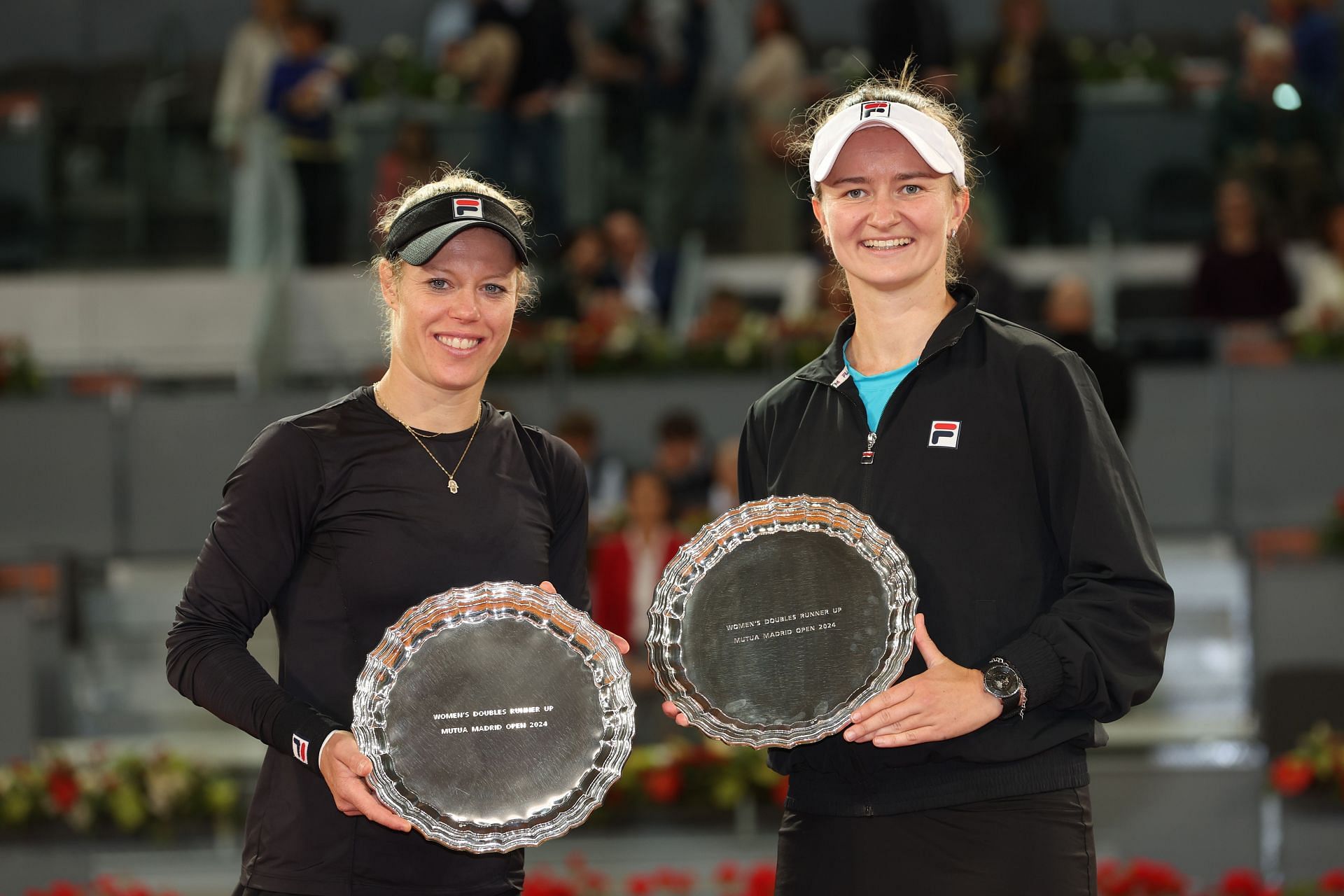 Laura Siegemund and Barbora Krejcikova with their runners-up trophies at the Madrid Open.